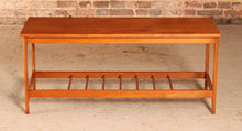 Load image into Gallery viewer, Mid Century teak coffee table with a magazine rack, circa 1960s
