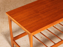 Load image into Gallery viewer, Mid Century teak coffee table with a magazine rack, circa 1960s
