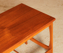 Load image into Gallery viewer, Mid Century teak coffee table with a magazine rack, circa 1960s
