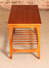 Load image into Gallery viewer, Mid Century teak coffee table with a magazine rack, circa 1960s

