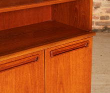 Load image into Gallery viewer, Mid Century glass fronted teak bookcase by Meredew, circa 1970s
