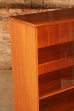 Load image into Gallery viewer, Mid Century glass fronted teak bookcase by Meredew, circa 1970s

