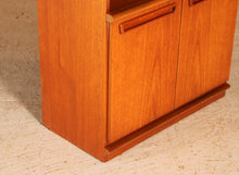 Load image into Gallery viewer, Mid Century glass fronted teak bookcase by Meredew, circa 1970s
