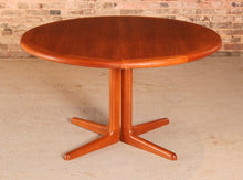 Load image into Gallery viewer, Danish Mid Century teak extending round dining table by Edvard Valentinsen, circa 1960s.
