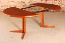 Load image into Gallery viewer, Danish Mid Century teak extending round dining table by Edvard Valentinsen, circa 1960s.
