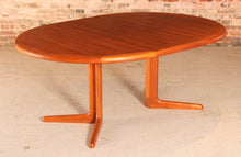 Load image into Gallery viewer, Danish Mid Century teak extending round dining table by Edvard Valentinsen, circa 1960s.
