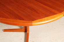 Load image into Gallery viewer, Danish Mid Century teak extending round dining table by Edvard Valentinsen, circa 1960s.
