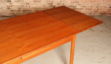 Load image into Gallery viewer, Danish Mid Century extending teak dining table, circa 1970s
