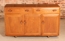 Load image into Gallery viewer, Mid Century Ercol Windsor solid elm sideboard on casters, circa 1960s
