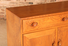 Load image into Gallery viewer, Mid Century Ercol Windsor solid elm sideboard on casters, circa 1960s
