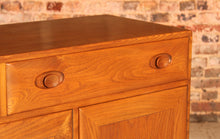 Load image into Gallery viewer, Mid Century Ercol Windsor solid elm sideboard on casters, circa 1960s
