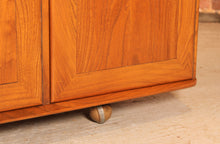 Load image into Gallery viewer, Mid Century Ercol Windsor solid elm sideboard on casters, circa 1960s
