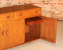 Load image into Gallery viewer, Mid Century Ercol Windsor solid elm sideboard on casters, circa 1960s
