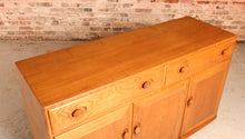 Load image into Gallery viewer, Mid Century Ercol Windsor solid elm sideboard on casters, circa 1960s

