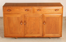Load image into Gallery viewer, Mid Century Ercol Windsor solid elm sideboard on casters, circa 1960s
