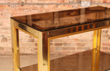 Load image into Gallery viewer, Italian Hollywood Regency brass and smoked glass Etagere / Shelving unit by Renato Zevi for Romeo Rega, circa 1970s
