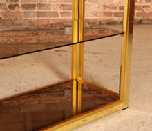 Load image into Gallery viewer, Italian Hollywood Regency brass and smoked glass Etagere / Shelving unit by Renato Zevi for Romeo Rega, circa 1970s
