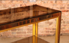 Load image into Gallery viewer, Italian Hollywood Regency brass and smoked glass Etagere / Shelving unit by Renato Zevi for Romeo Rega, circa 1970s
