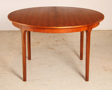 Load image into Gallery viewer, Mid Century round extending teak dining table by McIntosh, circa 1960s
