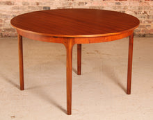 Load image into Gallery viewer, Mid Century round extending teak dining table by McIntosh, circa 1960s
