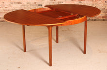 Load image into Gallery viewer, Mid Century round extending teak dining table by McIntosh, circa 1960s
