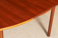 Load image into Gallery viewer, Mid Century round extending teak dining table by McIntosh, circa 1960s
