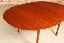 Load image into Gallery viewer, Mid Century round extending teak dining table by McIntosh, circa 1960s
