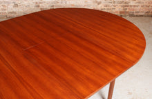 Load image into Gallery viewer, Mid Century round extending teak dining table by McIntosh, circa 1960s
