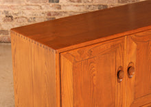 Load image into Gallery viewer, A mid century Ercol Windsor elm sideboard on casters, circa 1960s
