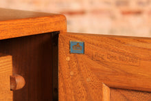Load image into Gallery viewer, A mid century Ercol Windsor elm sideboard on casters, circa 1960s
