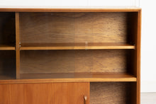 Load image into Gallery viewer, Midcentury Slim Teak Bookcase with Sliding Doors by Herbert E Gibbs c.1965
