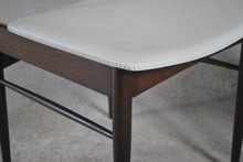 Load image into Gallery viewer, A pair of Mid Century dining chairs with original white vinyl upholstery, circa 1960s.
