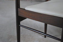 Load image into Gallery viewer, A pair of Mid Century dining chairs with original white vinyl upholstery, circa 1960s.
