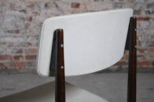Load image into Gallery viewer, A pair of Mid Century dining chairs with original white vinyl upholstery, circa 1960s.
