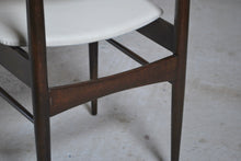 Load image into Gallery viewer, A pair of Mid Century dining chairs with original white vinyl upholstery, circa 1960s.

