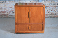 Load image into Gallery viewer, Danish Mid Century Dyrlund teak media cabinet on casters, circa 1970s
