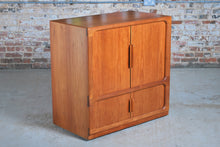 Load image into Gallery viewer, Danish Mid Century Dyrlund teak media cabinet on casters, circa 1970s
