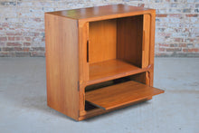 Load image into Gallery viewer, Danish Mid Century Dyrlund teak media cabinet on casters, circa 1970s
