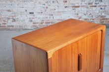 Load image into Gallery viewer, Danish Mid Century Dyrlund teak media cabinet on casters, circa 1970s
