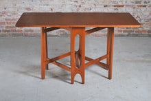 Load image into Gallery viewer, Mid Century rectangular drop leaf teak dining tabe, circa 1960s.
