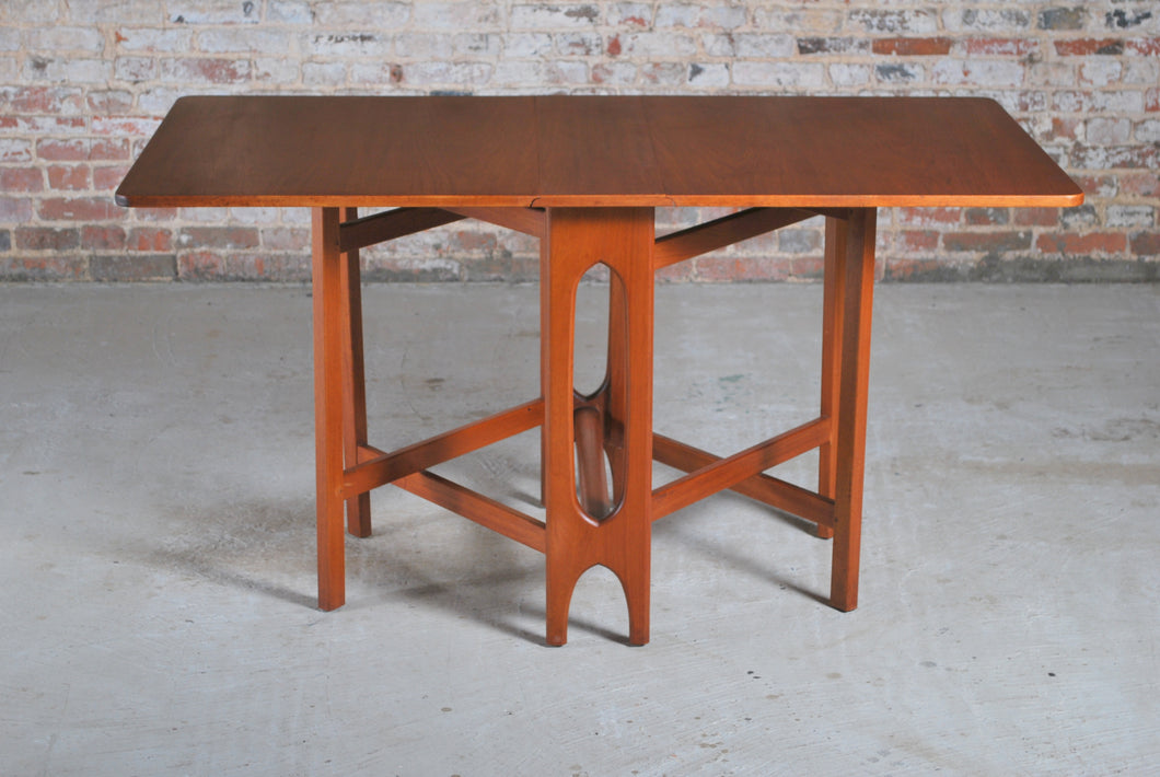 Mid Century rectangular drop leaf teak dining tabe, circa 1960s.