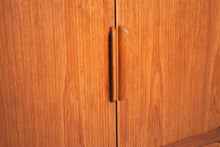 Load image into Gallery viewer, Danish Mid Century Dyrlund teak media cabinet on casters, circa 1970s
