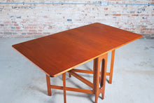 Load image into Gallery viewer, Mid Century rectangular drop leaf teak dining tabe, circa 1960s.
