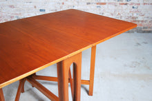 Load image into Gallery viewer, Mid Century rectangular drop leaf teak dining tabe, circa 1960s.
