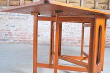 Load image into Gallery viewer, Mid Century rectangular drop leaf teak dining tabe, circa 1960s.
