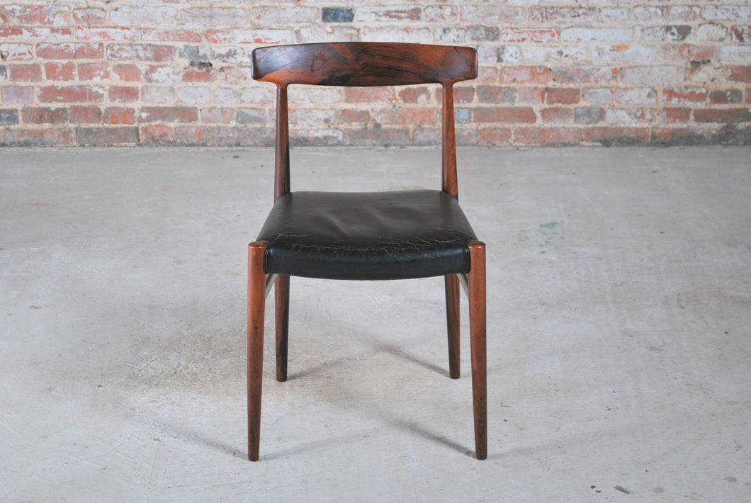 Danish Mid Century rosewood dining chair with original leather upholstery, circa 1960s.
