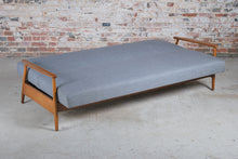 Load image into Gallery viewer, A Mid Century sofabed newly reupholstered in grey fabric, circa 1960s
