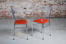 Load image into Gallery viewer, Set of 4 Mid Century chrome and vinyl dining chairs with original red upholstery.
