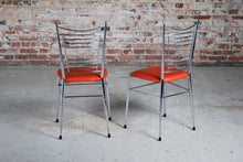 Load image into Gallery viewer, Set of 4 Mid Century chrome and vinyl dining chairs with original red upholstery.

