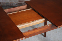 Load image into Gallery viewer, Mid Century extending teak dining table and 6 chairs, circa 1960s.
